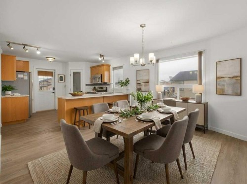32 Hunter Road, Sylvan Lake, AB - Indoor Photo Showing Dining Room