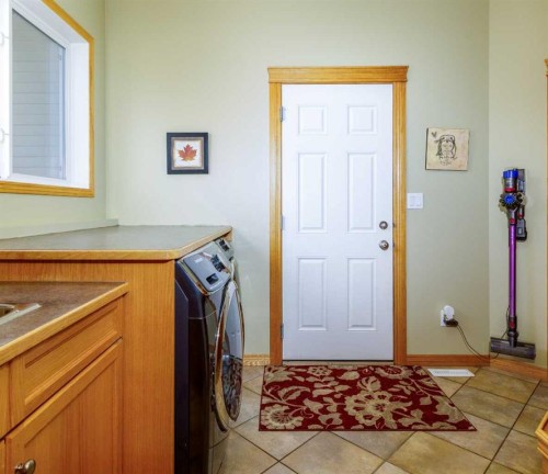 64 Lacey Close, Red Deer, AB - Indoor Photo Showing Laundry Room