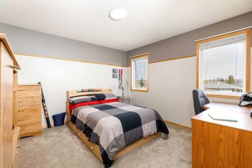 64 Lacey Close, Red Deer, AB - Indoor Photo Showing Bedroom