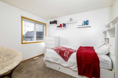 64 Lacey Close, Red Deer, AB - Indoor Photo Showing Bedroom