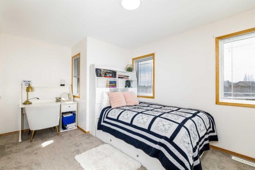 64 Lacey Close, Red Deer, AB - Indoor Photo Showing Bedroom