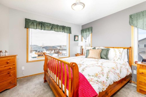 64 Lacey Close, Red Deer, AB - Indoor Photo Showing Bedroom