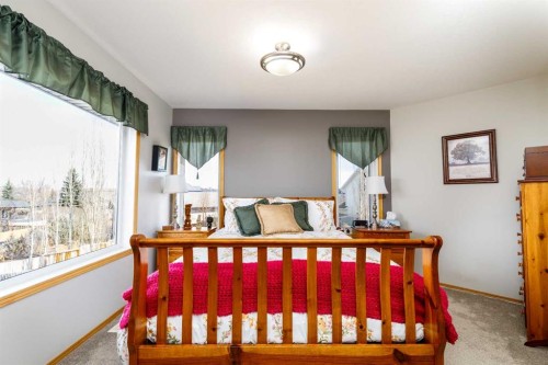 64 Lacey Close, Red Deer, AB - Indoor Photo Showing Bedroom