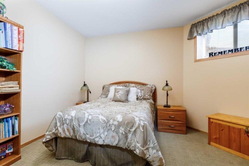 64 Lacey Close, Red Deer, AB - Indoor Photo Showing Bedroom