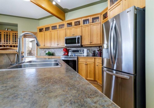64 Lacey Close, Red Deer, AB - Indoor Photo Showing Kitchen With Double Sink
