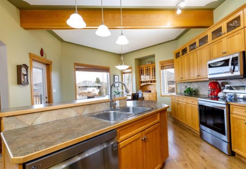 64 Lacey Close, Red Deer, AB - Indoor Photo Showing Kitchen With Double Sink