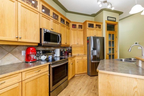 64 Lacey Close, Red Deer, AB - Indoor Photo Showing Kitchen With Double Sink