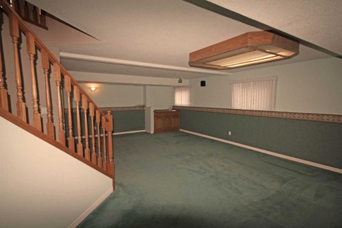 25 Willow Springs Crescent, Sylvan Lake, AB - Indoor Photo Showing Other Room