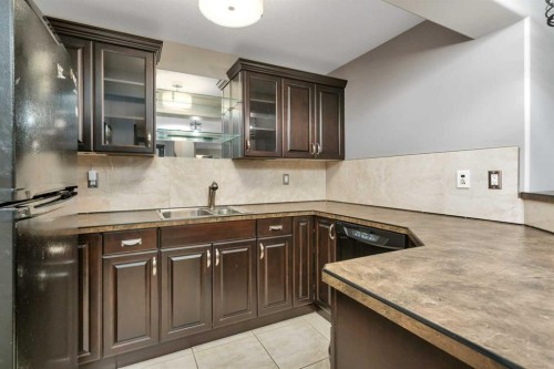 310 Jarvis Glen Way, Jarvis Bay, AB - Indoor Photo Showing Kitchen With Double Sink