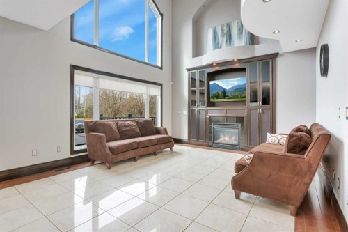 310 Jarvis Glen Way, Jarvis Bay, AB - Indoor Photo Showing Other Room With Fireplace