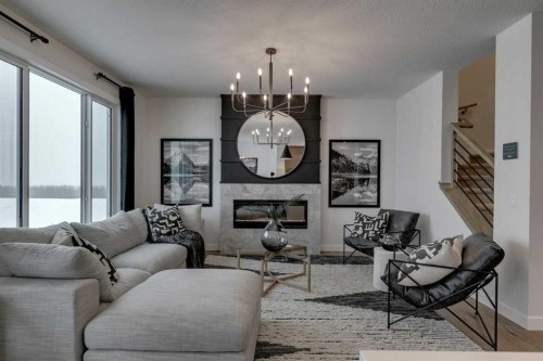 731 Langley Terrace Se, Airdrie, AB - Indoor Photo Showing Living Room With Fireplace