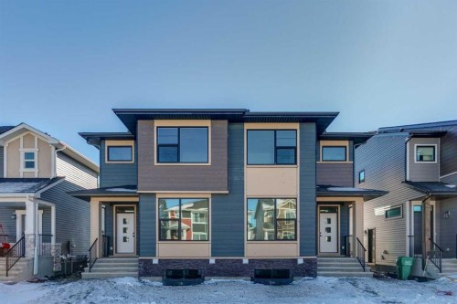335 Fireside Drive, Cochrane, AB - Outdoor With Facade
