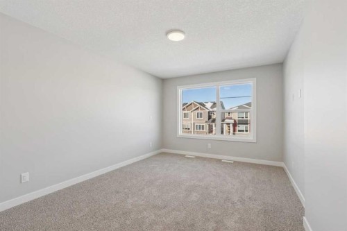 335 Fireside Drive, Cochrane, AB - Indoor Photo Showing Other Room