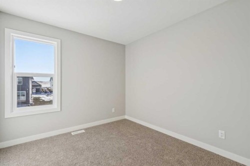 335 Fireside Drive, Cochrane, AB - Indoor Photo Showing Other Room