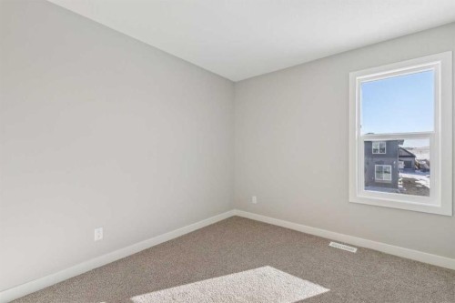 335 Fireside Drive, Cochrane, AB - Indoor Photo Showing Other Room