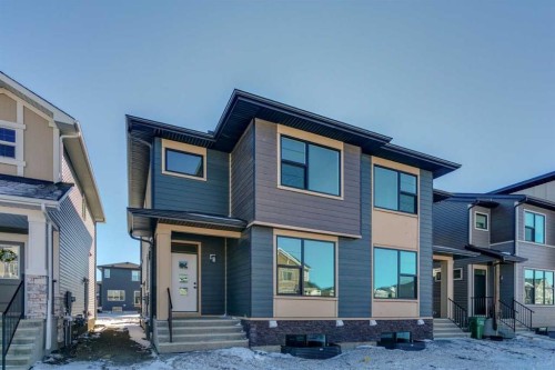 335 Fireside Drive, Cochrane, AB - Outdoor With Facade