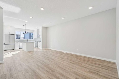 335 Fireside Drive, Cochrane, AB - Indoor Photo Showing Kitchen With Upgraded Kitchen