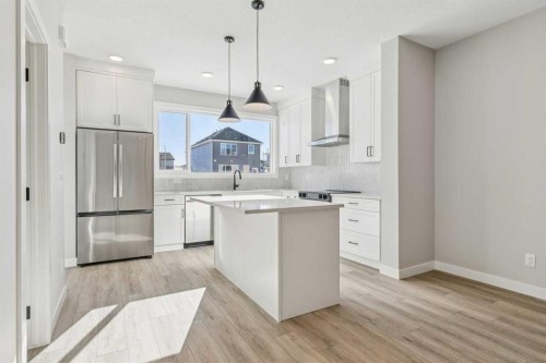 335 Fireside Drive, Cochrane, AB - Indoor Photo Showing Kitchen With Upgraded Kitchen