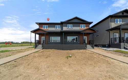6336 26 Avenue, Camrose, AB - Outdoor With Deck Patio Veranda With Facade