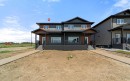 6336 26 Avenue, Camrose, AB  - Outdoor With Deck Patio Veranda With Facade 