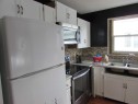 65 Roberts Crescent, Red Deer, AB  - Indoor Photo Showing Kitchen With Double Sink 