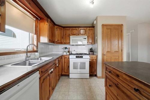 44 Duval Close, Red Deer, AB - Indoor Photo Showing Kitchen With Double Sink