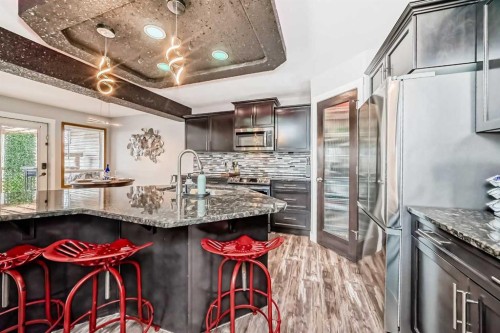 42 Jade Place, Red Deer, AB - Indoor Photo Showing Kitchen With Upgraded Kitchen