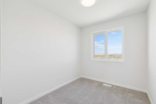 70 Lucas Heath Nw, Calgary, AB - Indoor Photo Showing Other Room