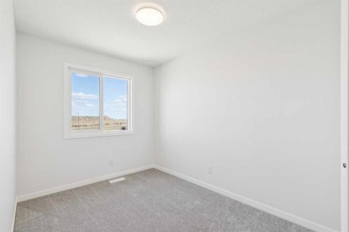 70 Lucas Heath Nw, Calgary, AB - Indoor Photo Showing Other Room