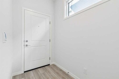 70 Lucas Heath Nw, Calgary, AB - Indoor Photo Showing Other Room