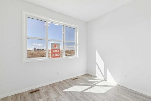 70 Lucas Heath Nw, Calgary, AB - Indoor Photo Showing Other Room