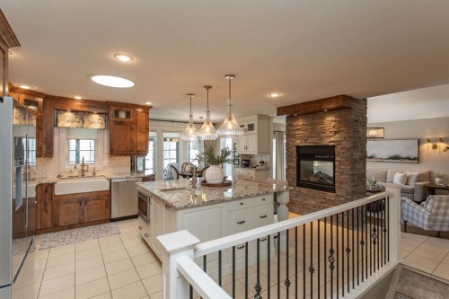 21 Dandell Close, Red Deer, AB - Indoor Photo Showing Other Room With Fireplace