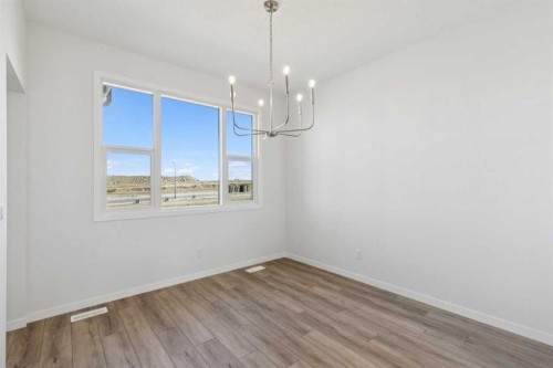 74 Lucas Heath Nw, Calgary, AB - Indoor Photo Showing Other Room
