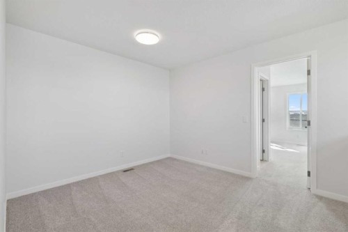 74 Lucas Heath Nw, Calgary, AB - Indoor Photo Showing Other Room