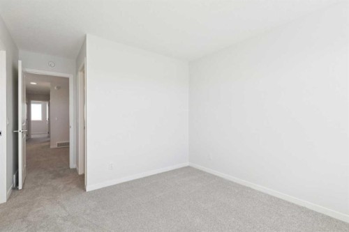 74 Lucas Heath Nw, Calgary, AB - Indoor Photo Showing Other Room