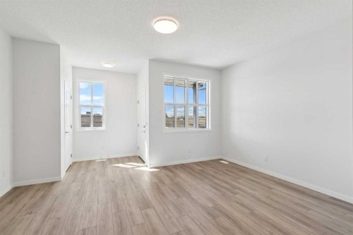 74 Lucas Heath Nw, Calgary, AB - Indoor Photo Showing Other Room