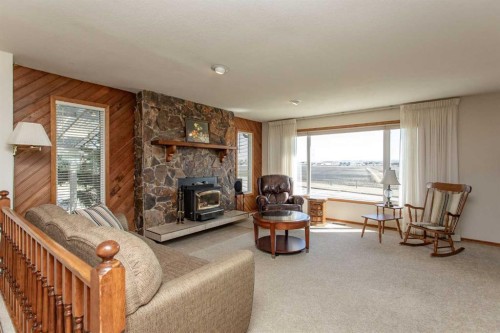 13 43 Avenue Close, Lacombe, AB - Indoor Photo Showing Living Room With Fireplace