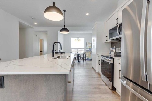 44 Lavelle Close, Red Deer, AB - Indoor Photo Showing Kitchen With Double Sink With Upgraded Kitchen