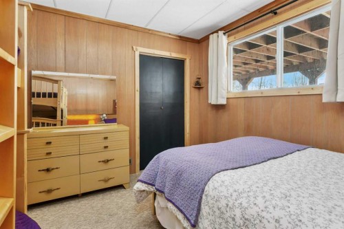 1225 Breakers Way, Sunbreaker Cove, AB - Indoor Photo Showing Bedroom