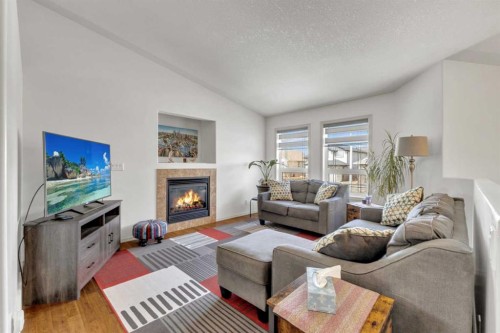 88 Valentine Crescent, Red Deer, AB - Indoor Photo Showing Living Room With Fireplace