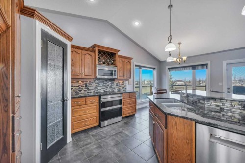 82 Ingram Close, Red Deer, AB - Indoor Photo Showing Kitchen With Double Sink