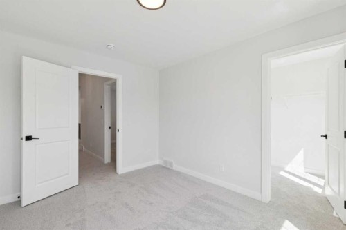 599 Buffaloberry Manor Se, Calgary, AB - Indoor Photo Showing Other Room