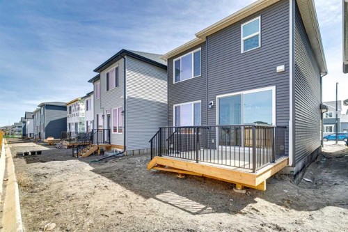 599 Buffaloberry Manor Se, Calgary, AB - Outdoor With Deck Patio Veranda With Exterior