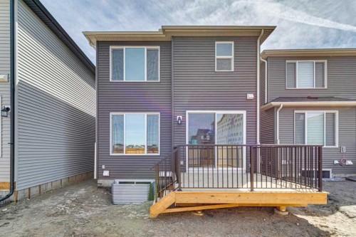 599 Buffaloberry Manor Se, Calgary, AB - Outdoor With Deck Patio Veranda With Exterior