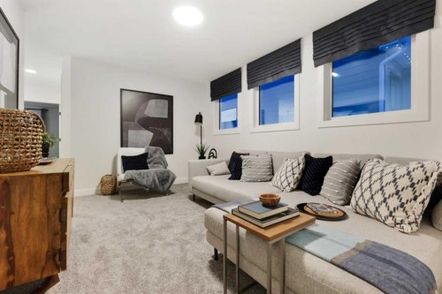 599 Buffaloberry Manor Se, Calgary, AB - Indoor Photo Showing Living Room