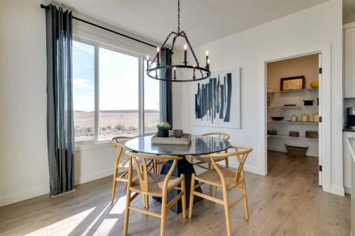 94 Bridgeport Landing, Chestermere, AB - Indoor Photo Showing Dining Room