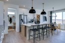 94 Bridgeport Landing, Chestermere, AB  - Indoor Photo Showing Kitchen With Upgraded Kitchen 