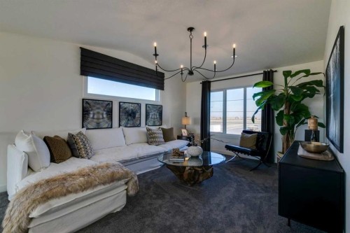 94 Bridgeport Landing, Chestermere, AB - Indoor Photo Showing Living Room