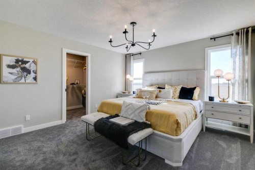 94 Bridgeport Landing, Chestermere, AB - Indoor Photo Showing Bedroom