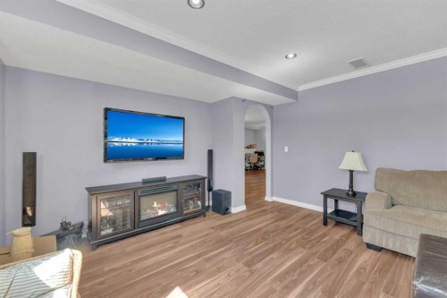 21 Silver Drive, Blackfalds, AB - Indoor Photo Showing Living Room With Fireplace